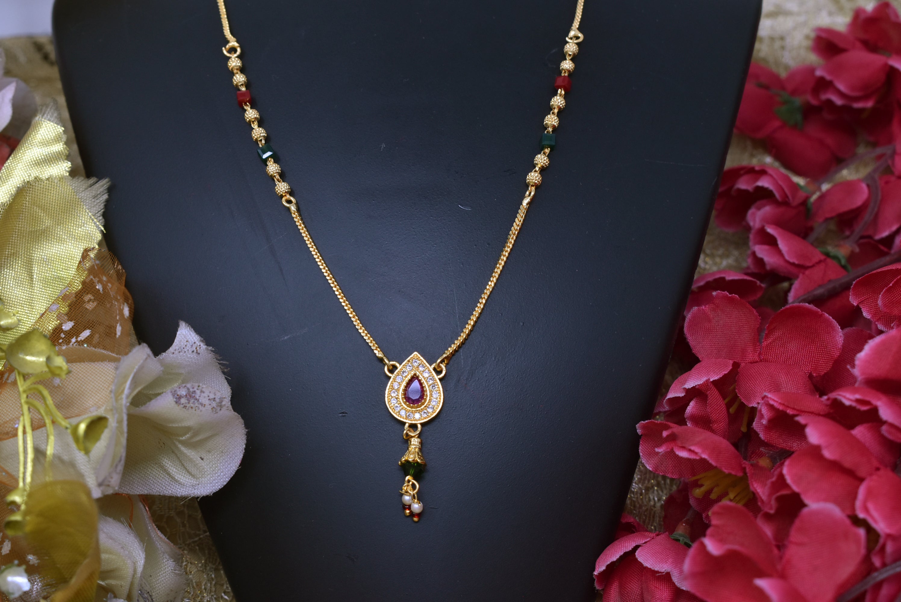 Indian Jewellery from Meira Jewellery:,Gold Plated AD Mangalsutra Dokia Test