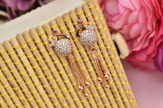 Rose gold plated earrings,bali earrings,stud,huggis,Jhumaka,jhumki big earrings,long earrings,earrings for girls,partywear earrings,bollywood earrings,wedding earrings,heavy designer earrings,