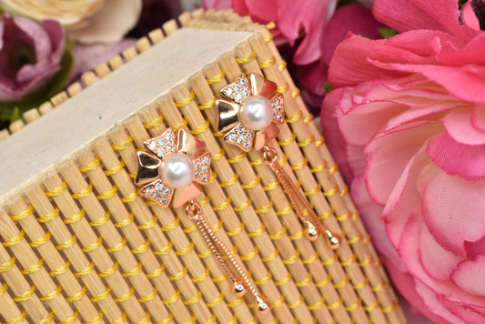 Rose gold plated earrings,bali earrings,stud,huggis,Jhumaka,jhumki big earrings,long earrings,earrings for girls,partywear earrings,bollywood earrings,wedding earrings,heavy designer earrings,