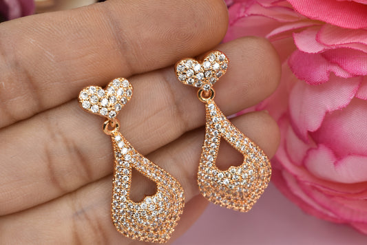 Rose gold plated earrings,bali earrings,stud,huggis,Jhumaka,jhumki big earrings,long earrings,earrings for girls,partywear earrings,bollywood earrings,wedding earrings,heavy designer earrings,