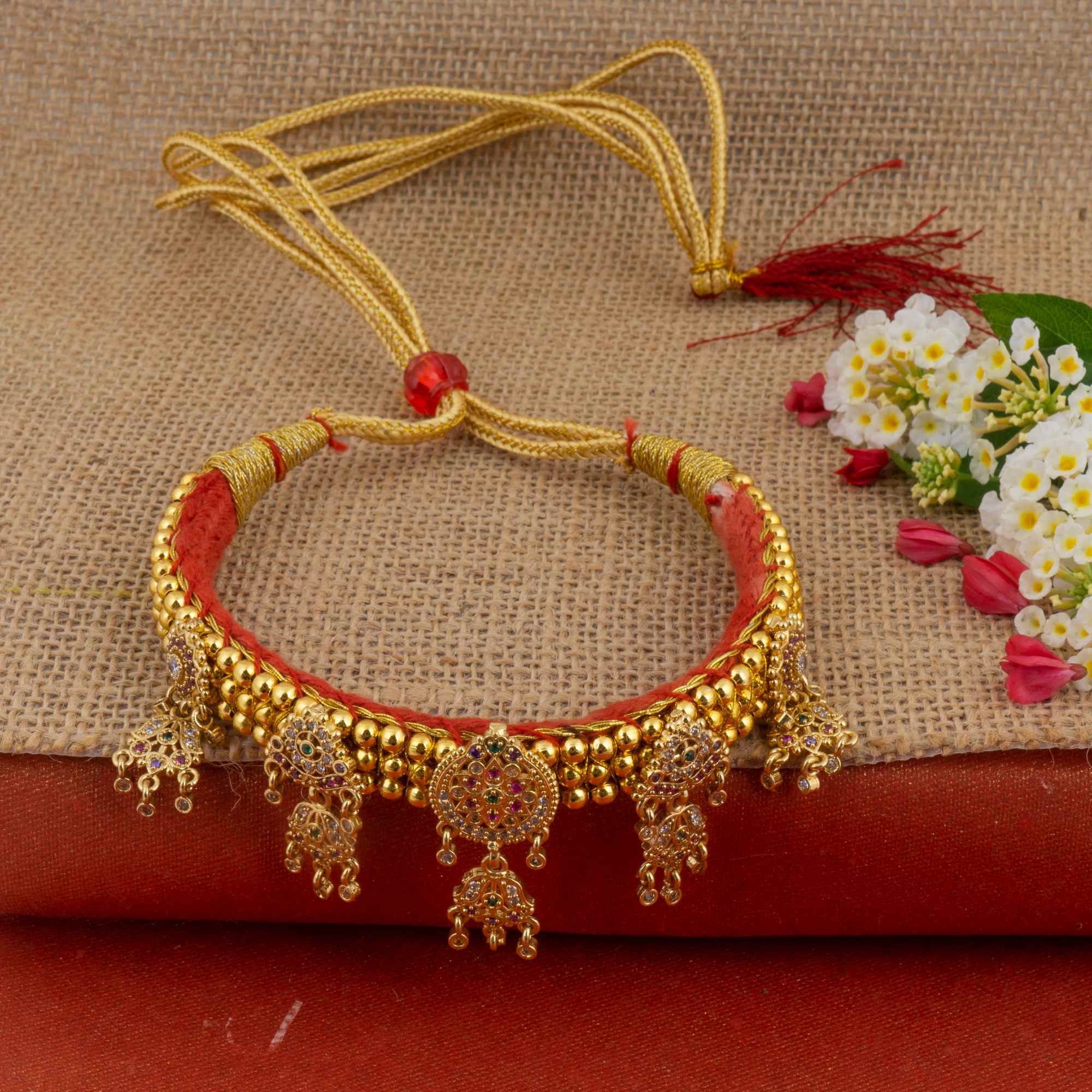 Golden and white combination Beads studded Kanthi with AD Pendal