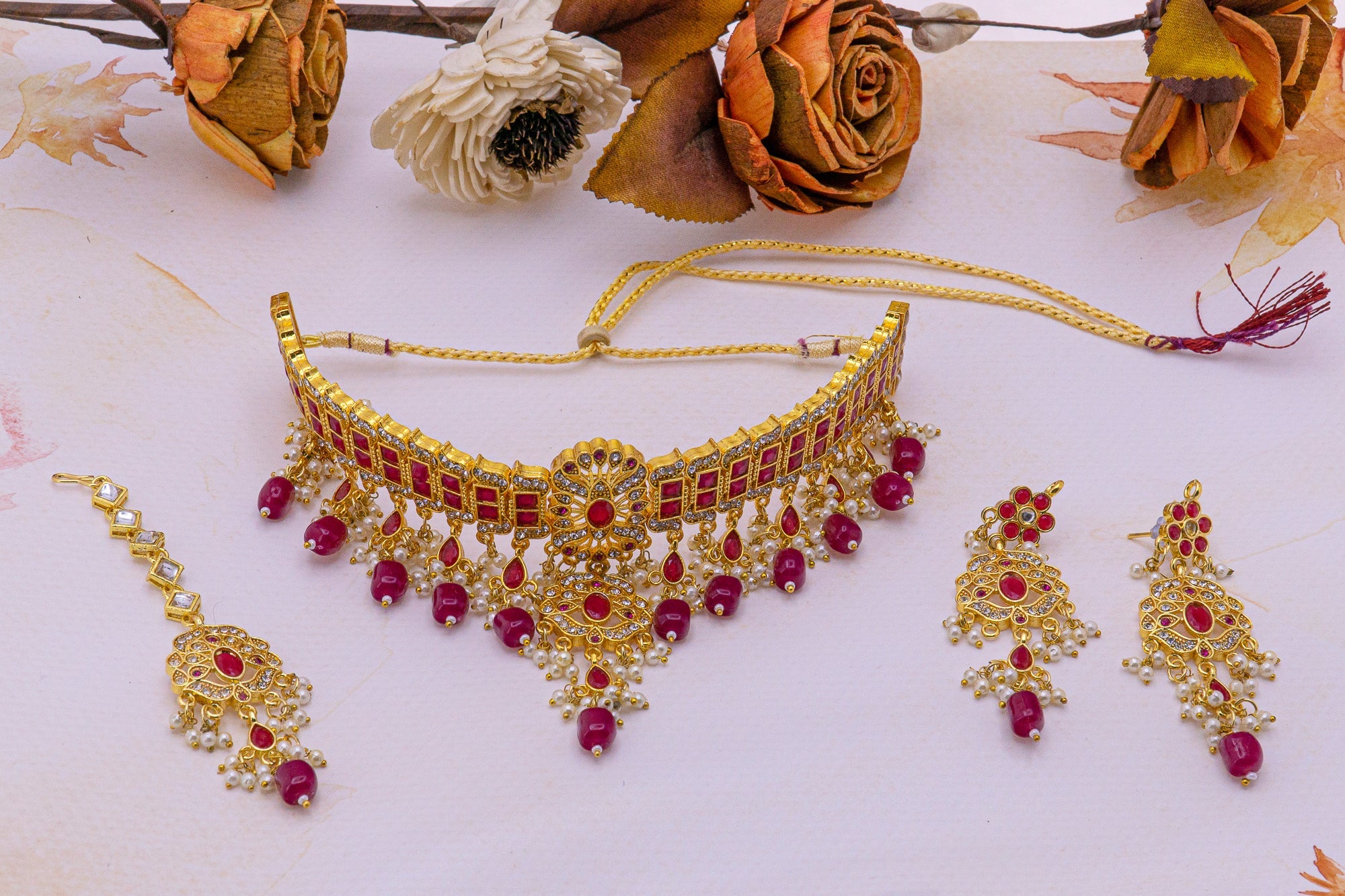 Traditional Pink color pearl and AD studded Golden Kanthi set for Women
