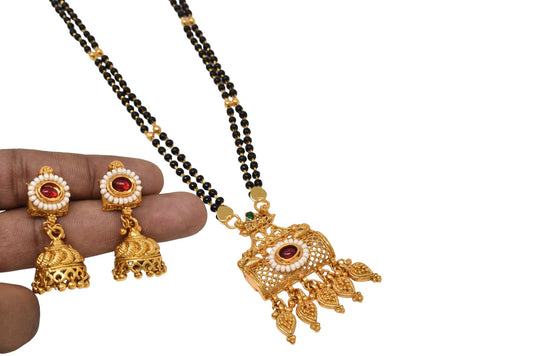 Golden and black beads chain with pendal