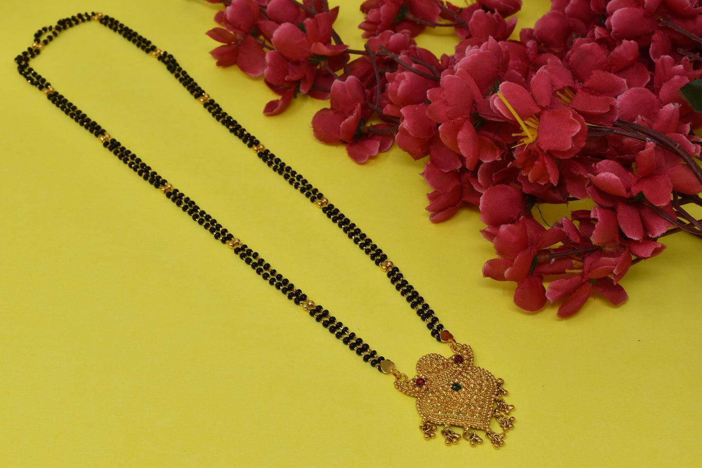 Gold Plated Mangalsutra with Golden and Black beads exclusively for Indian women.