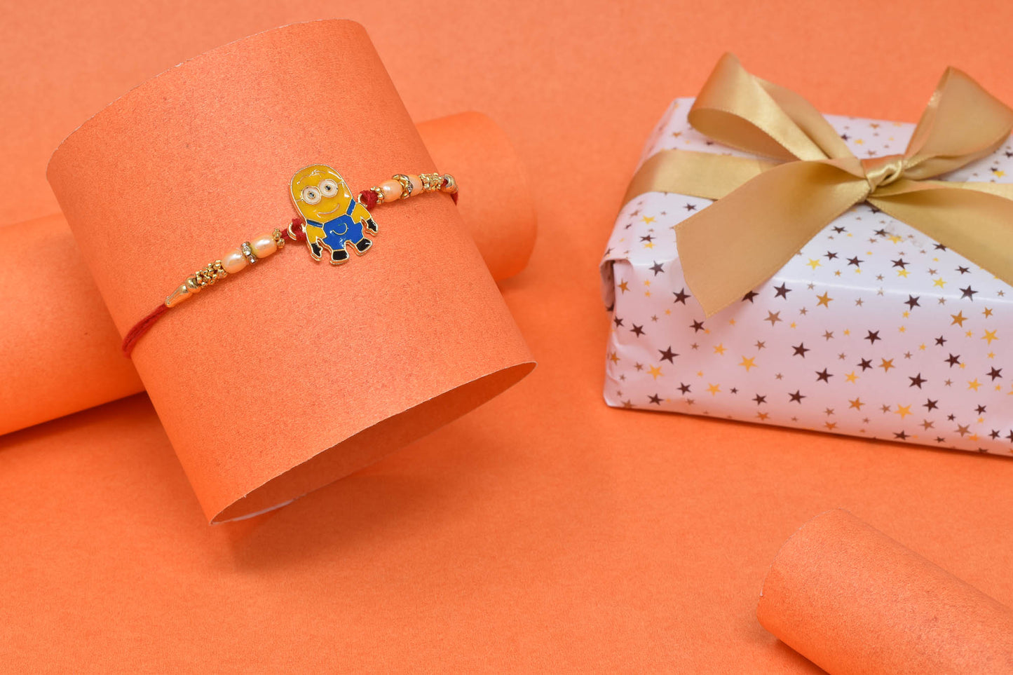 Minion Kids Rakhi with Roli Chawal and Raksha Bandhan Greeting Card For Boys (Multicolor)