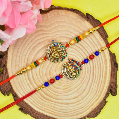 Brass Elegant Ganesha with Peacock Rakhi set with Roli Chawal & Card| rakhi for brother and bhabhi  kids| rakhi set of 2 | resin rakhi