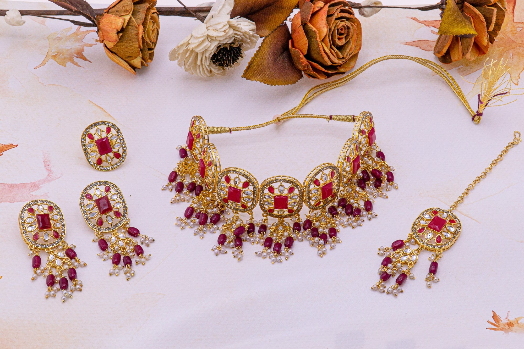 Traditional Pink color pearl and AD studded Golden Kanthi set for Women